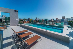 Adra 205 - Apartamento no centro de Bombinhas - Rooftop com piscina e academia - À poucos metros da praia